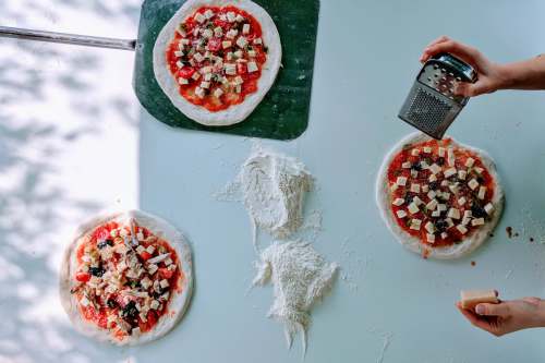 quartiere xx ardeatino three pizza pie on white surface rome